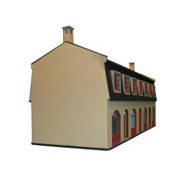 Byhus i 2 etager med 4 forretninger.